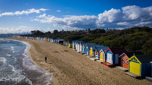 The normally packed Brighton Beach in Melbourne lies empty.