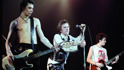 The Sex Pistols - Sid Vicious, Johnny Rotten and Steve Jones performing