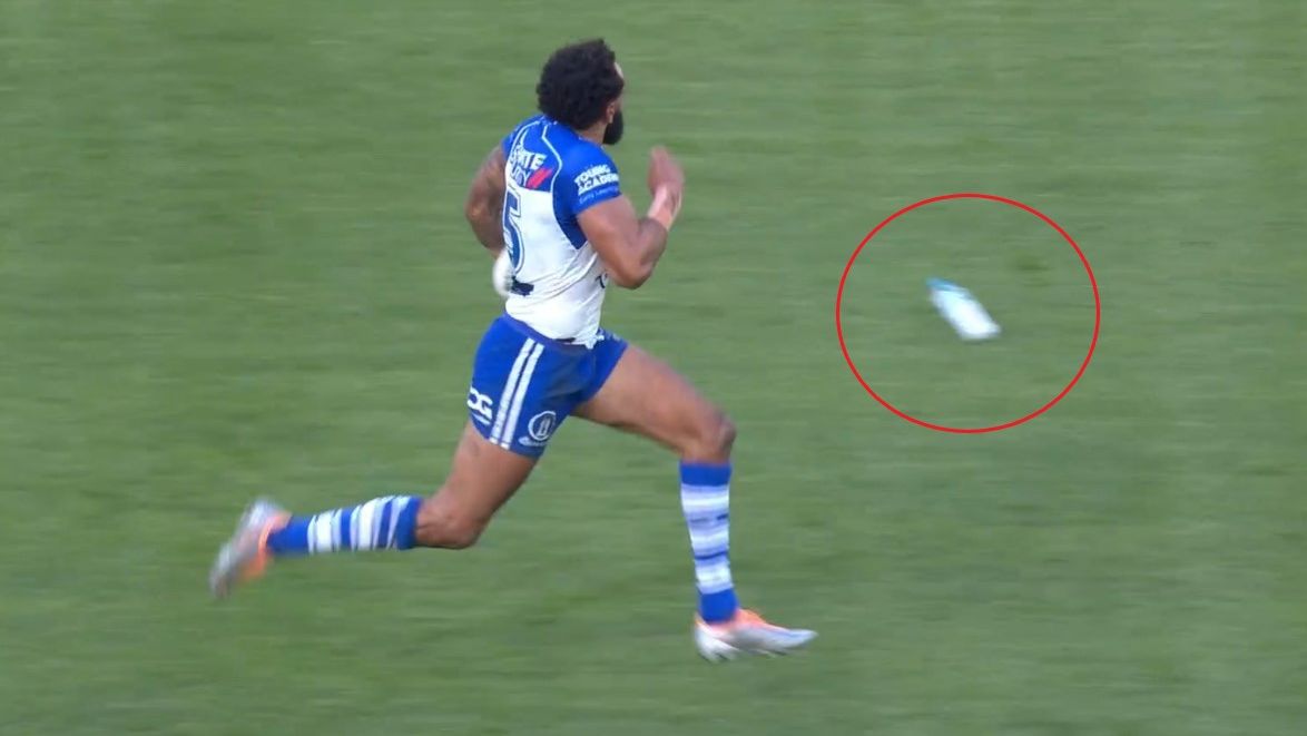 A bottle is thrown at a runaway Josh Addo-Carr.