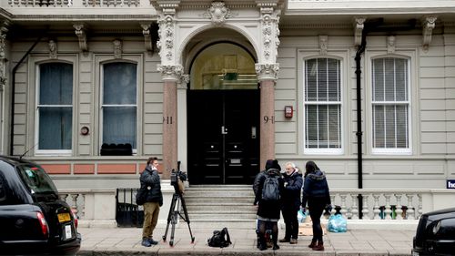 A file photo shows media outside the building that houses the offices of Orbis Business Intelligence Ltd, run by former MI6 agent Christopher Steele, in central London. (AAP)