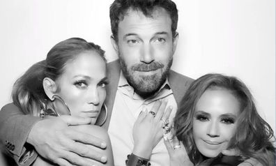 Jennifer Lopez, Ben Affleck and Leah Remini posed in a photo at a birthday party.