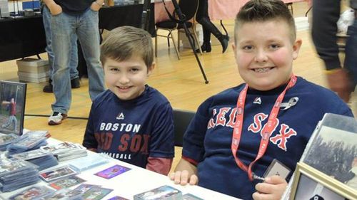 Boy sells off valuable baseball card collection to raise money for friend with cancer