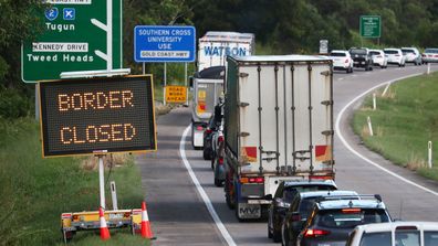 Traffic is seen on The Pacific Highway in New South Wales near the Queensland Border, Thursday, March 26, 2020. 