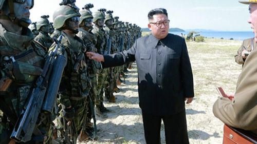 North Korean leader Kim Jong Un inspecting soldiers during what Korean Central News Agency called a "target-striking contest" at unknown location in North Korea. (Image: AAP)