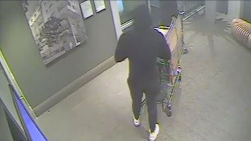 Three men caught on CCTV stealing a safe filled with jewellery from a store in Ultimo, Sydney.