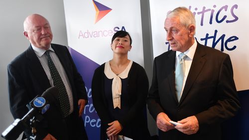 Advance SA candidate Jenny Low stood alongside Adelaide MP John Darley and lawyer Peter Humphries (left). (AAP)