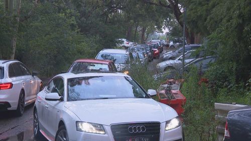 Cars wait at the North Ryde, Sydney COVID-19 testing centre.