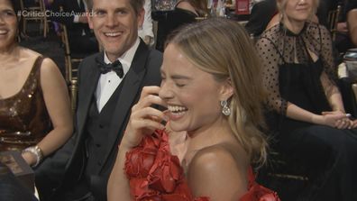 Margot Robbie reacts to Chelsea Handler's monologue at the 2024 Critics Choice Awards.