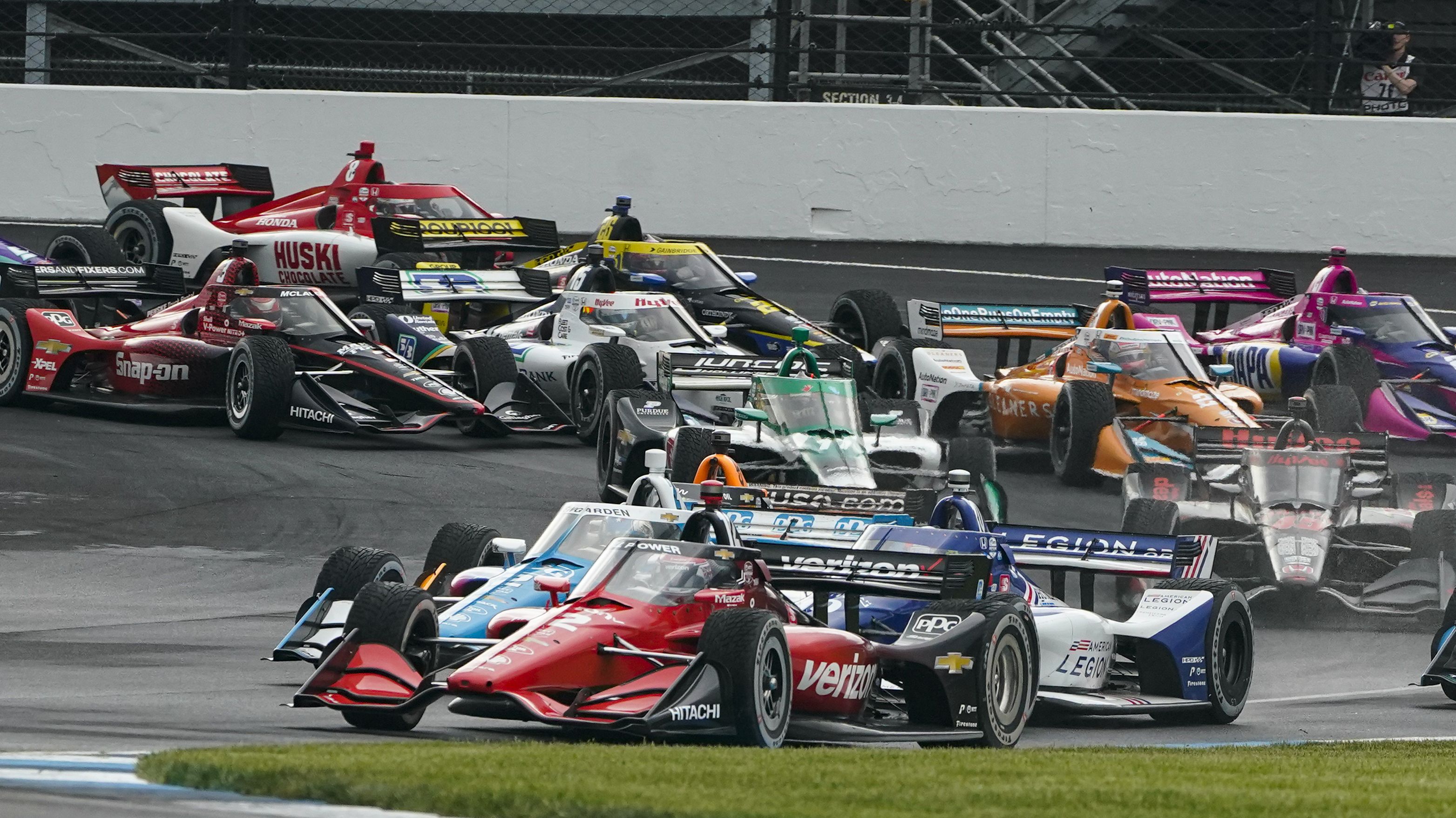 Australia&#x27;s Will Power leads the field at the start of the IndyCar Grand Prix.