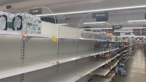 Coles at Lane Cove stripped of bottled water after water main bursts.