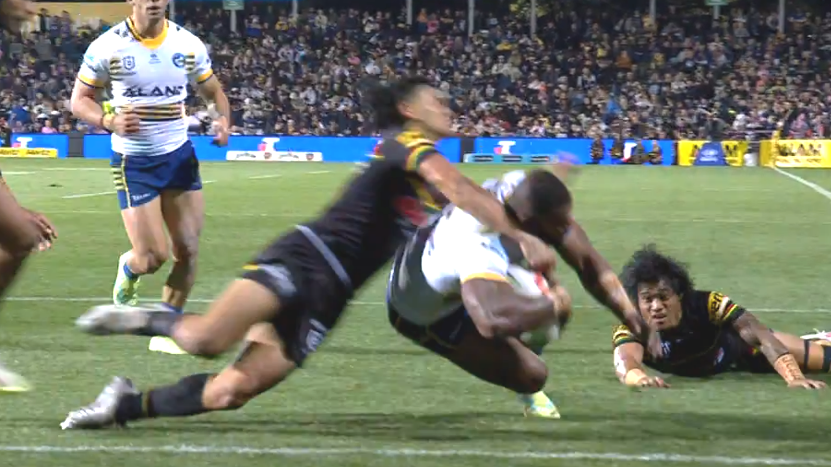Penrith&#x27;s Jesse McLean whacks Maika Sivo high for an eight-point try.