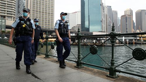 NSW Police patrol Sydney's Circular Quay as the city endures its ninth weekend of lockdown.