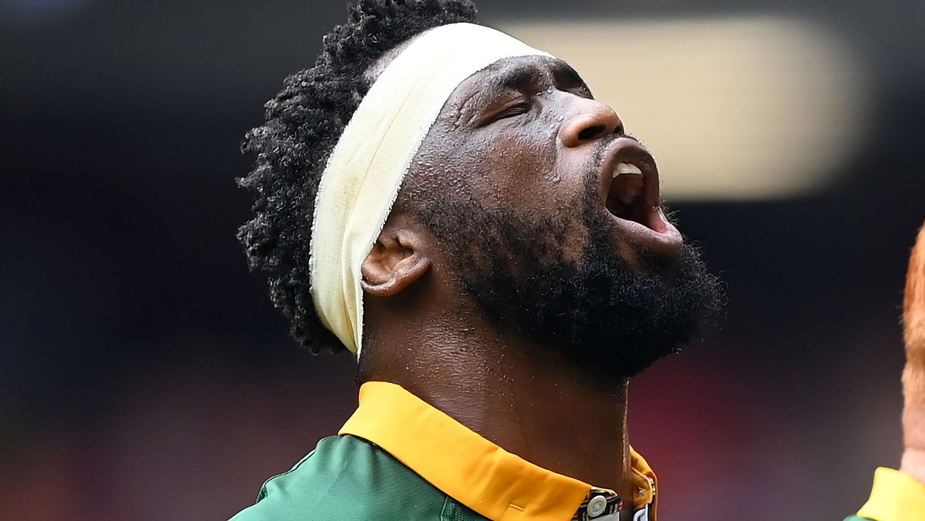 CARDIFF, WALES - AUGUST 19: Siya Kolisi of South Africa sings the national anthem  during the Summer International match between Wales and South Africa at Principality Stadium on August 19, 2023 in Cardiff, Wales. (Photo by Alex Davidson/Getty Images)