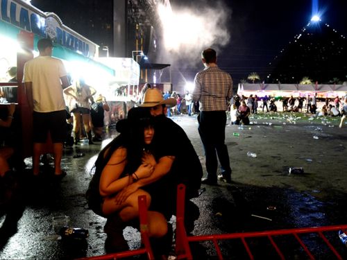 Country music fans struggle to take in what has just happened on a Sunday night in Vegas.