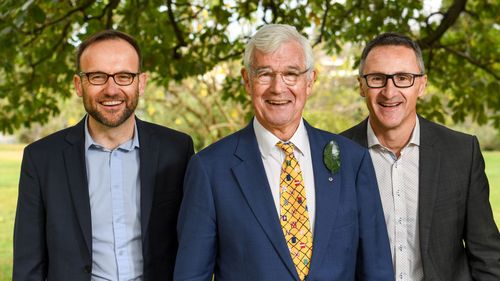 Greens MP Adam Bandt (left), Greens candidate for Kooyong Julian Burnside (centre) and Leader of the Australian Greens Dr Richard Di Natale (right).