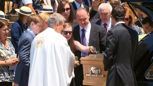 More than 1000 people gathered for Bartter's funeral. (AAP)