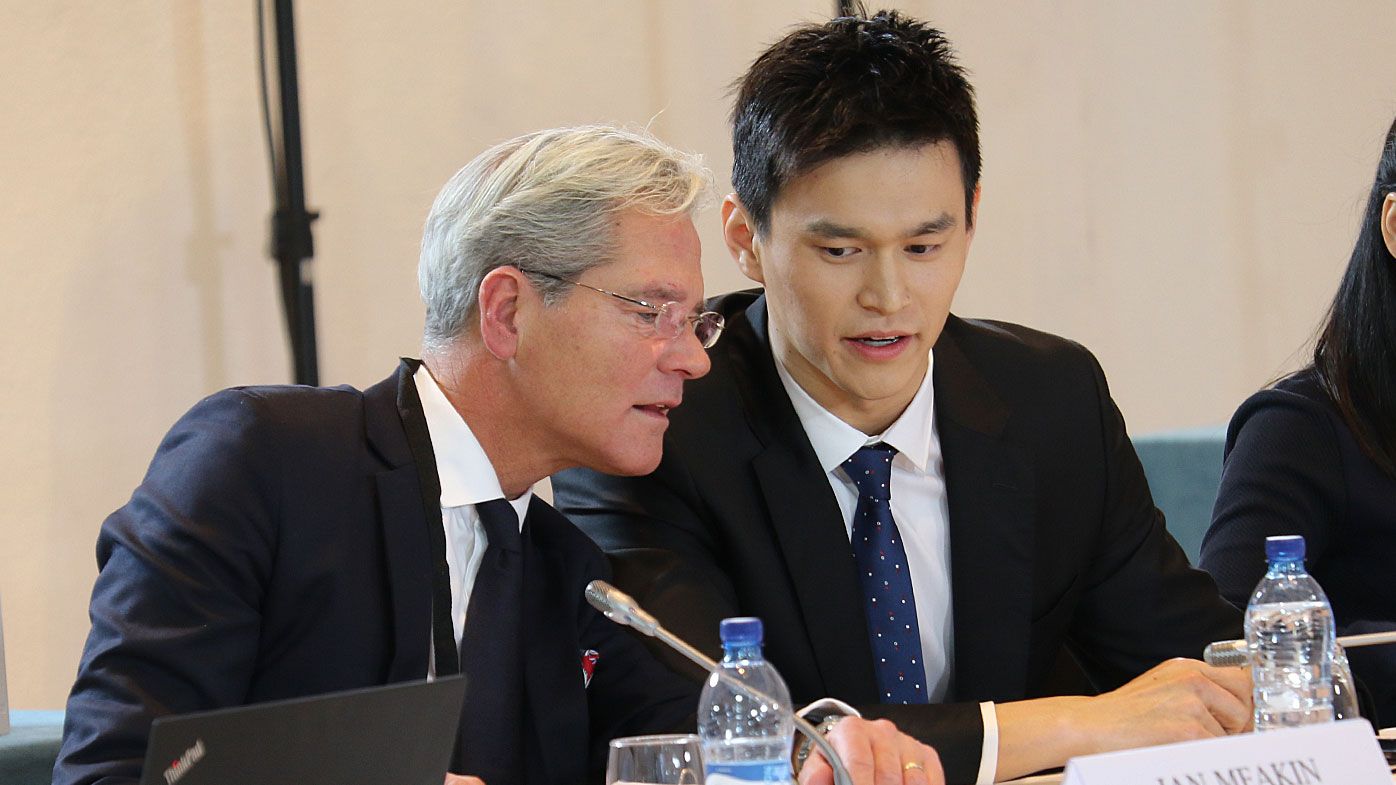 Chinese swimmer Sun Yang speaks with his counsel Ian Meaking prior to a public hearing before the Court of Arbitration for Sport (CAS) 