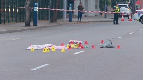 A 55-year-old woman who is believed to have been lying on a Darwin road overnight, was killed after being hit by a taxi. Picture: 9NEWS.