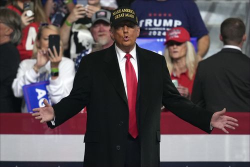 Republican presidential nominee former President Donald Trump arrives at a campaign rally at Atrium Health Amphitheater Sunday, Nov. 3, 2024, in Macon, Ga. (AP Photo/Mike Stewart)