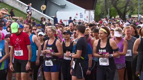 Runners anxiously converged at the start line of the 42 kilometre race. (9NEWS)