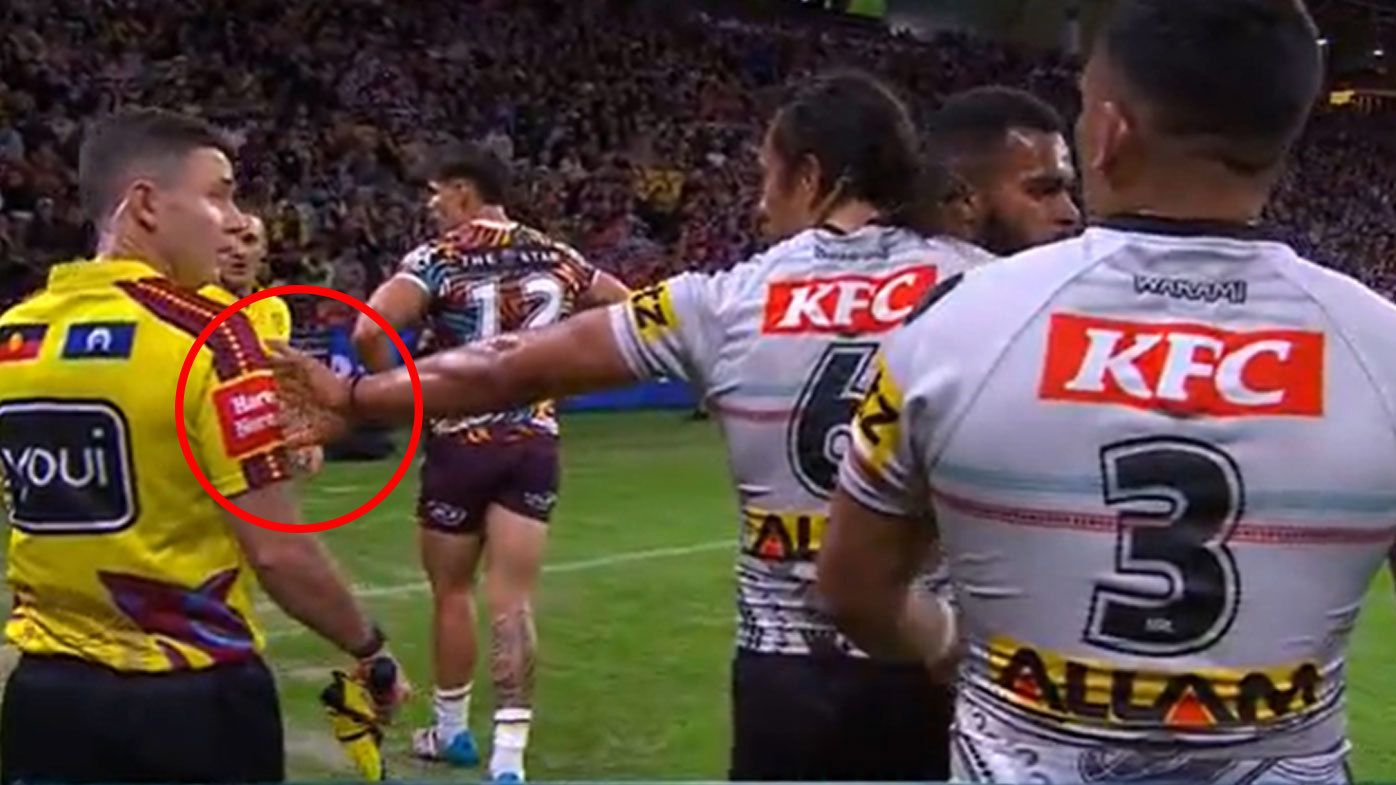 The touchline referee looked unimpressed as Jarome Luai touched him with his left hand after the Panthers&#x27; opener