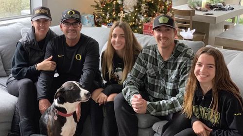 Photo showing three victims from the Altobelli family who were killed in the helicopter crash involving Kobe Bryant. Alyssa is on the far right, and Keri is pictured holding John's arm, on the far left. 