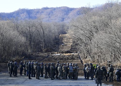 The three kilometre-long tactical road across the Military Demarcation Line inside the Demilitarized Zone (DMZ) will be used to support a joint project to excavate Korean War remains at a notorious battle site.