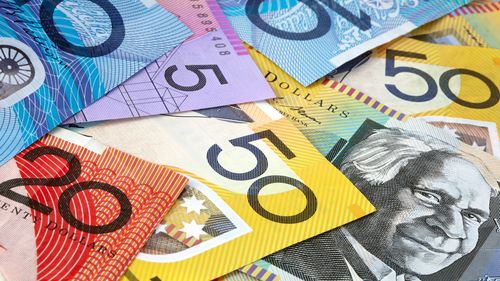 Australian money, in full-frame.  Fifty, twenty, ten and five dollar notes.