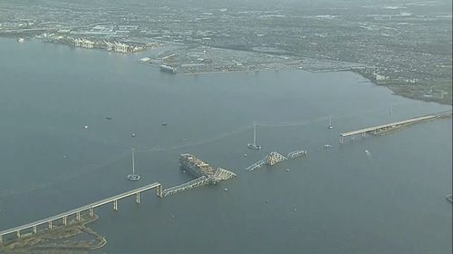 Parts of the Francis Scott Key Bridge remain after a container ship collided with one of the bridges support Tuesday, March 26, 2024 in Baltimore 