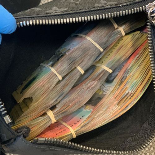 Cash was seized at one of the Sydney properties searched by police yesterday as part of the operation.