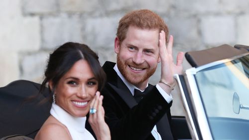 The Duke and Duchess of Sussex, Meghan Markle and Prince Harry, wave goodbye. Picture: PA