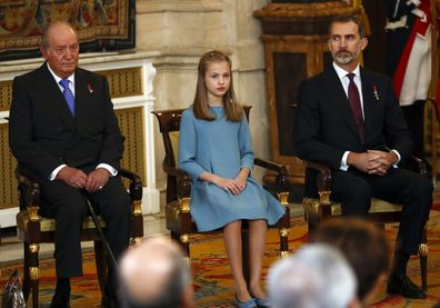 Spain's former King Juan Carlos, left, Princess Leonor and King Felipe sit during a ceremony in which Princess Leonor was presented with the insignia of the "Toison de Oro" in 2018.