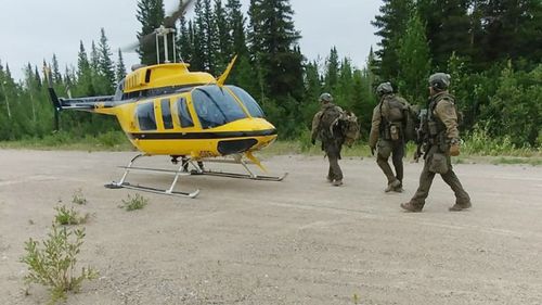 RCMP officers searching in the Gillam area on Manitoba for Bryer Schmegelsky, 18, and Kam McLeod, 19.