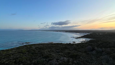 The walk takes place within wukalina, Mt William National Park, and larapuna, Bay of Fires, pictured here. These sites were of cultural significance to Palawa people as here they would meet for trade. 