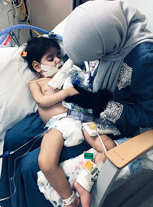 After battling US immigration authorities for more than a year for the right to enter the country and flying halfway around the world, a Yemeni mother finally got to hold her dying two-year-old son.