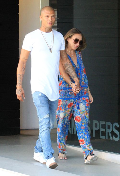 The couple enjoy a stroll in Los Angeles in October around the time Chloe fell pregnant. Picture: AP