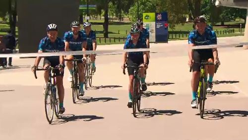The nine cyclists crossed the finish line at the MCG this afternoon. 