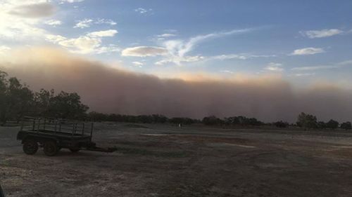 Locals at Dunlop Station near Bourke were treated to amazing views as the dust cloud rolled across the town's skyline.