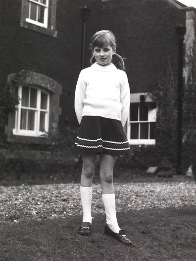 Princess Diana stands outside Park House on the Queen's Sandringham Estate in Norfolk, which is where she was born, in a photo taken by her father