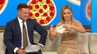 Karl Stefanovic and Ally Langdon play with ready made pizza dough