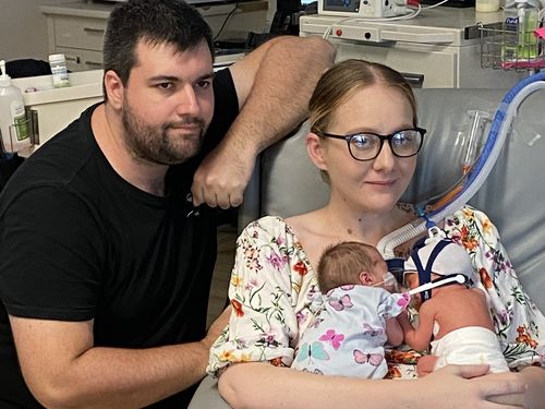 Queensland twins born on side of road in back of ambulance.