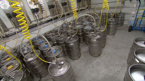 Kegs are being stocked ahead of the game. (9NEWS)