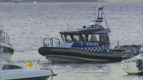Search underway as a man is missing after a boat capsized in Sydney Harbour this morning