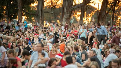 A crowded Christmas carols event last year.