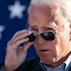 Joe Biden removing sunglasses (Getty)