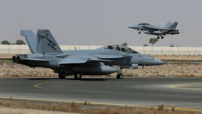 <b _tmplitem="1">Photos from Australia's military operation in Iraq:</b> The two Super Hornets departing Australia's main base in the Middle East to conduct their first combat mission in Iraq in October. (Picture: ADF)