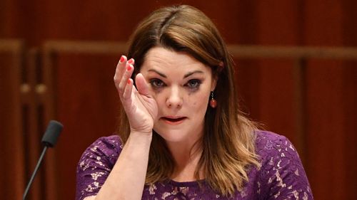 Greens Senator Sarah Hanson-Young cries as she speaks on the same sex marriage bill in the Senate chamber at Parliament House in Canberra, Monday, November 27, 2017.