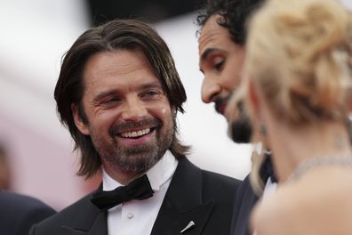 Sebastian Stan, from left, director Ali Abbasi, and Maria Bakalova pose for photographers upon arrival at the premiere of the film 'The Apprentice' at the 77th international film festival, Cannes, southern France, Monday, May 20, 2024. 