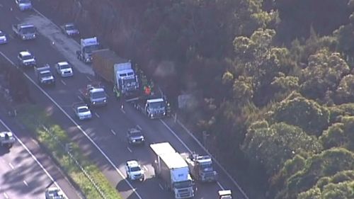 Traffic backed up 11km following serious two-truck crash on the M1 at Cowan