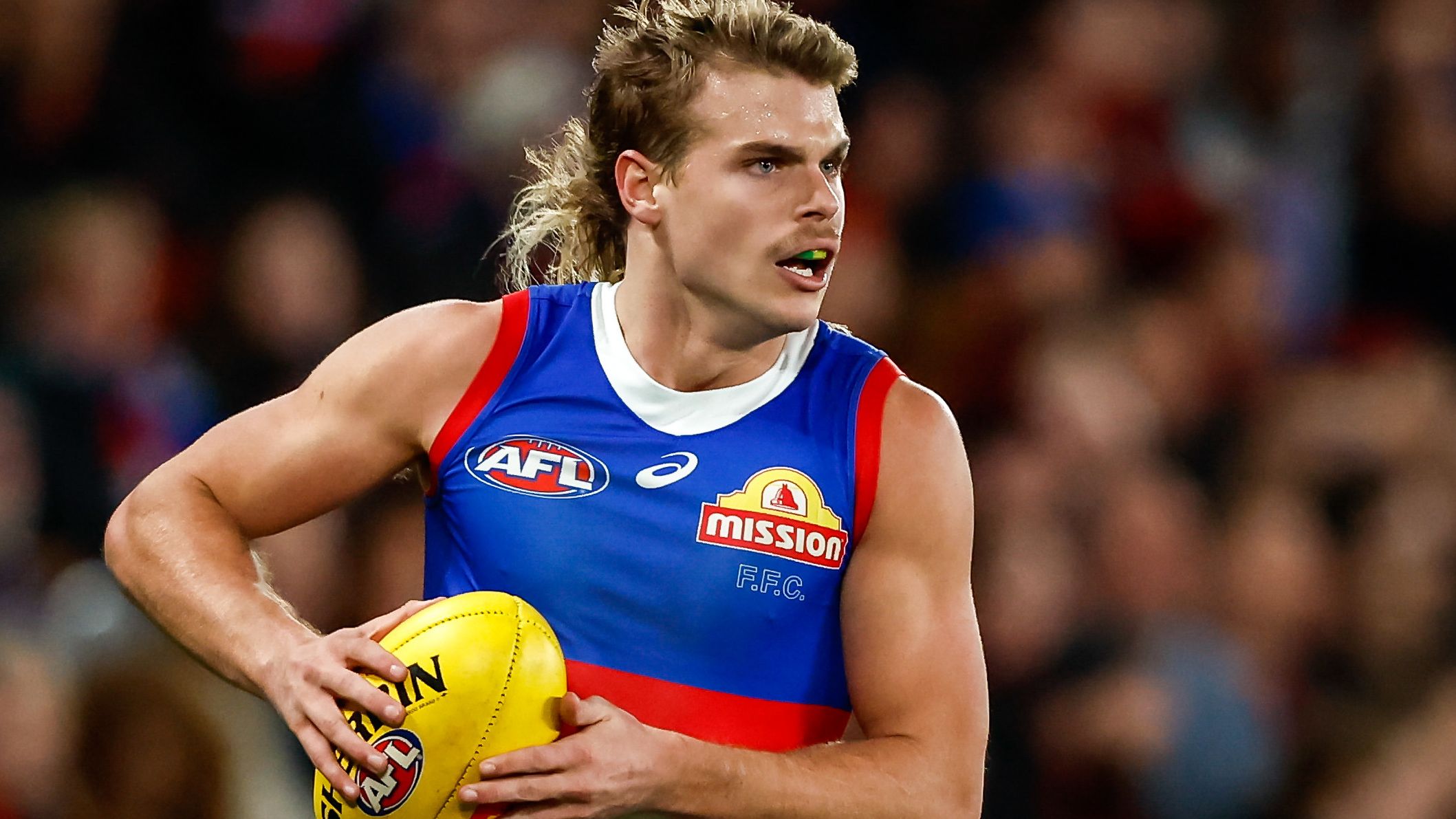 MELBOURNE, AUSTRALIA - JULY 21: Bailey Smith of the Bulldogs in action during the 2023 AFL Round 19 match between the Essendon Bombers and the Western Bulldogs at Marvel Stadium on July 21, 2023 in Melbourne, Australia. (Photo by Dylan Burns/AFL Photos via Getty Images)
